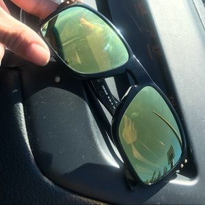 Black and yellow lens Oakley sun glasses